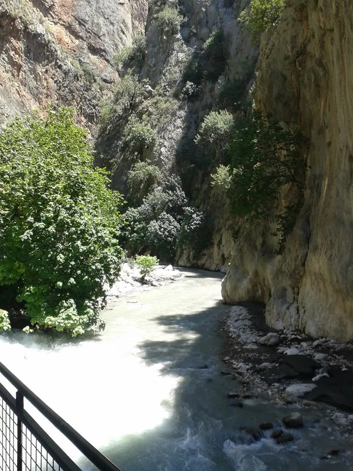 River and rock walls inside Saklıkent Canyon